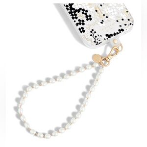 KATE SPADE NEW YORK PHONE CHARM WRISTLET